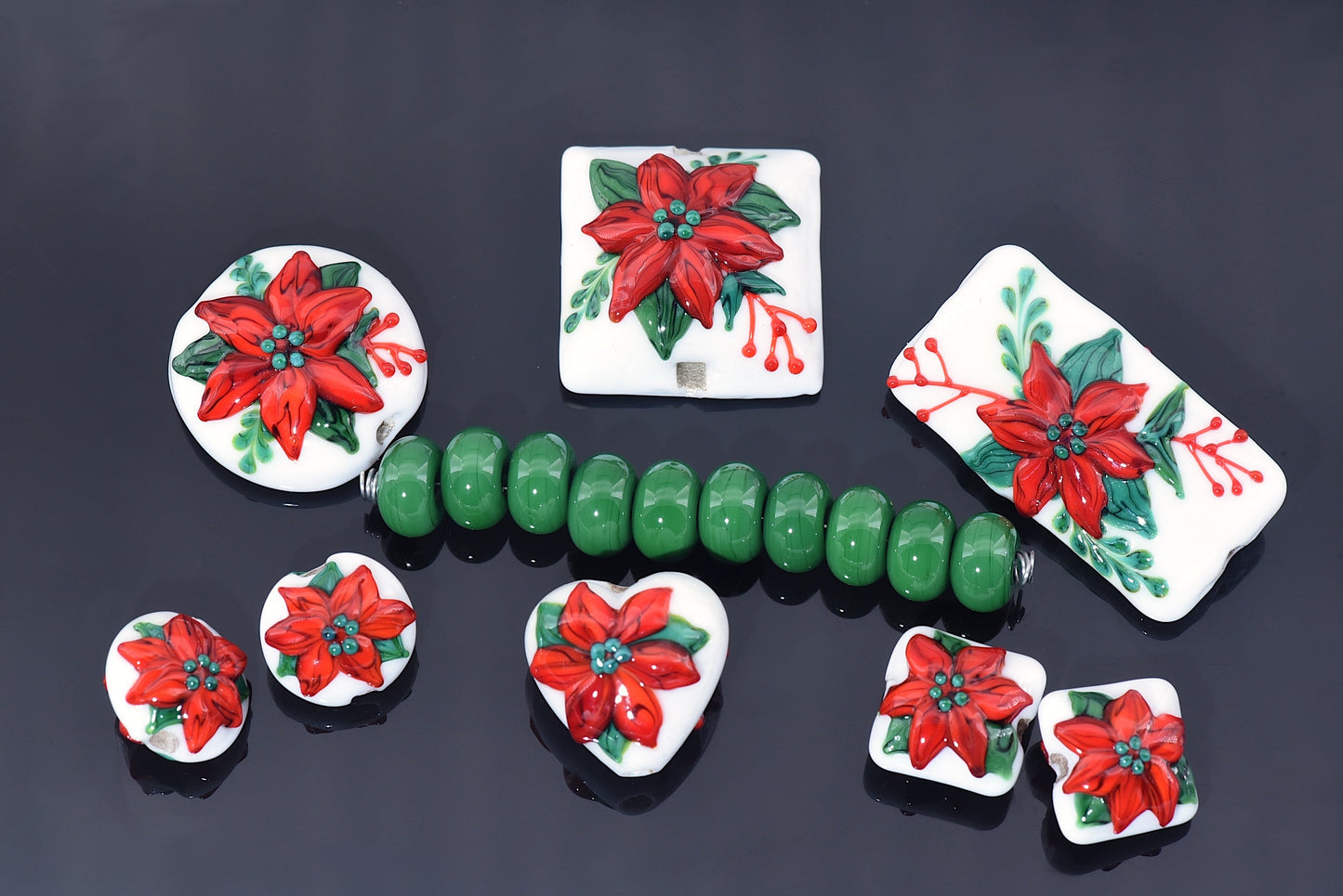 10707812 - Four Red Poinsettia Christmas Lentil Beads