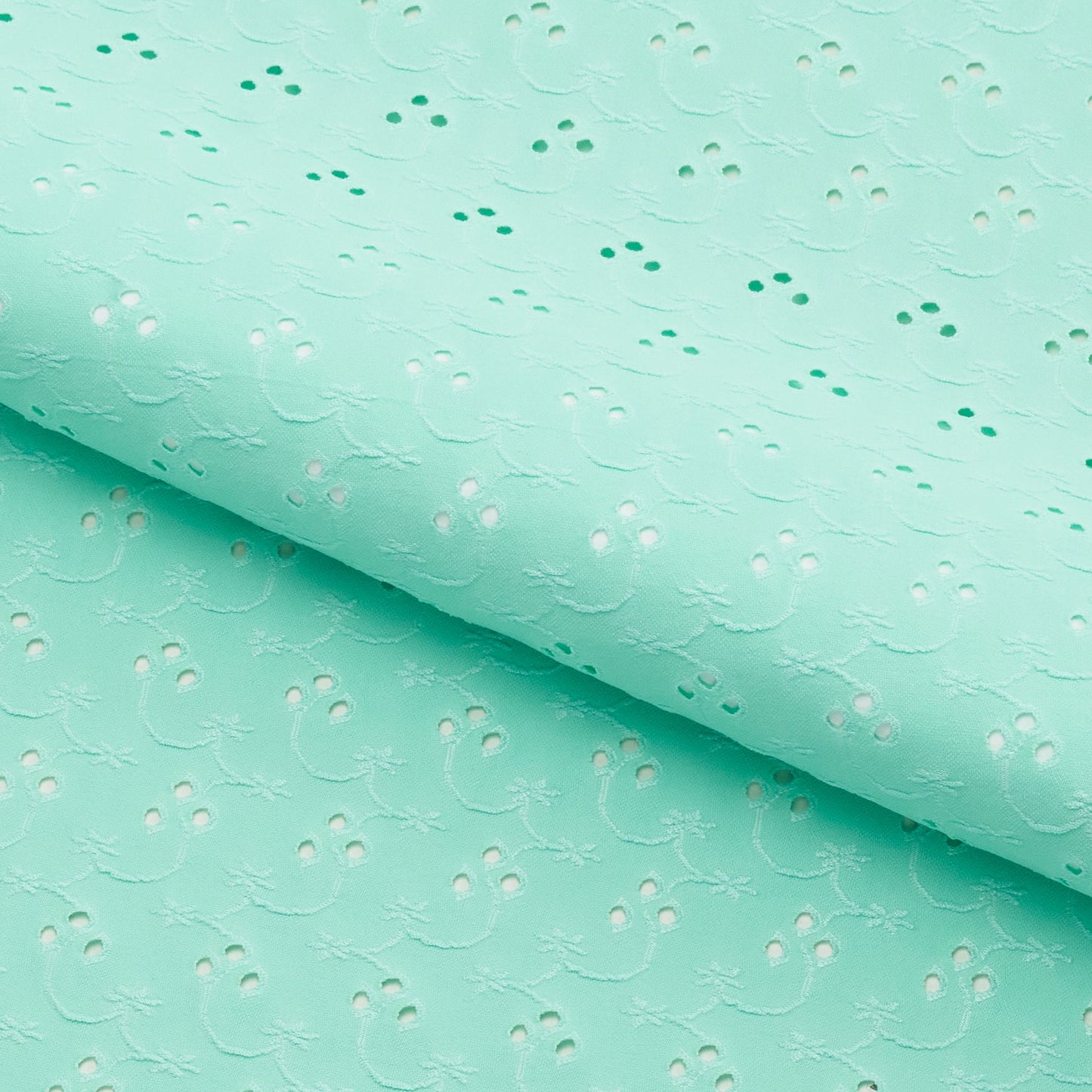 Eyelet Polyester Spandex Jacquard Fabric | Blue Moon Fabrics