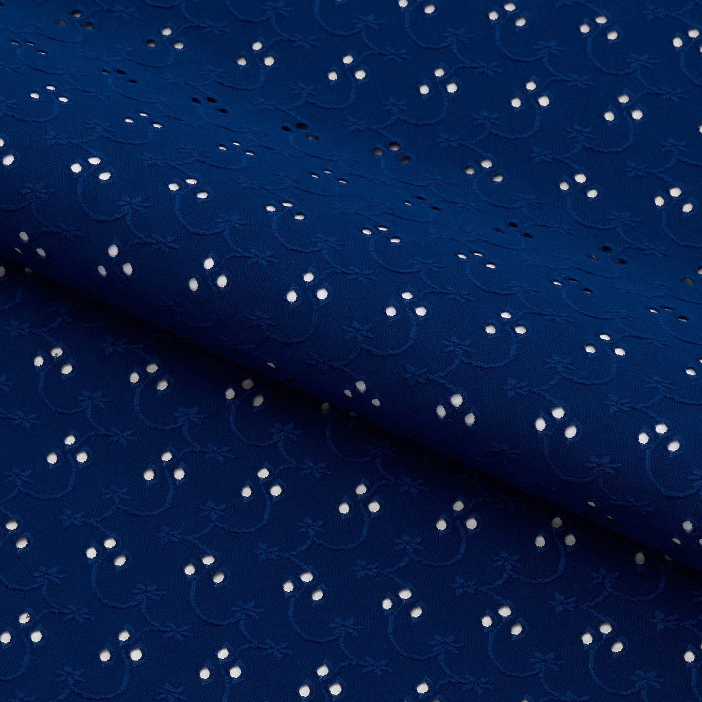 Eyelet Polyester Spandex Jacquard Fabric | Blue Moon Fabrics