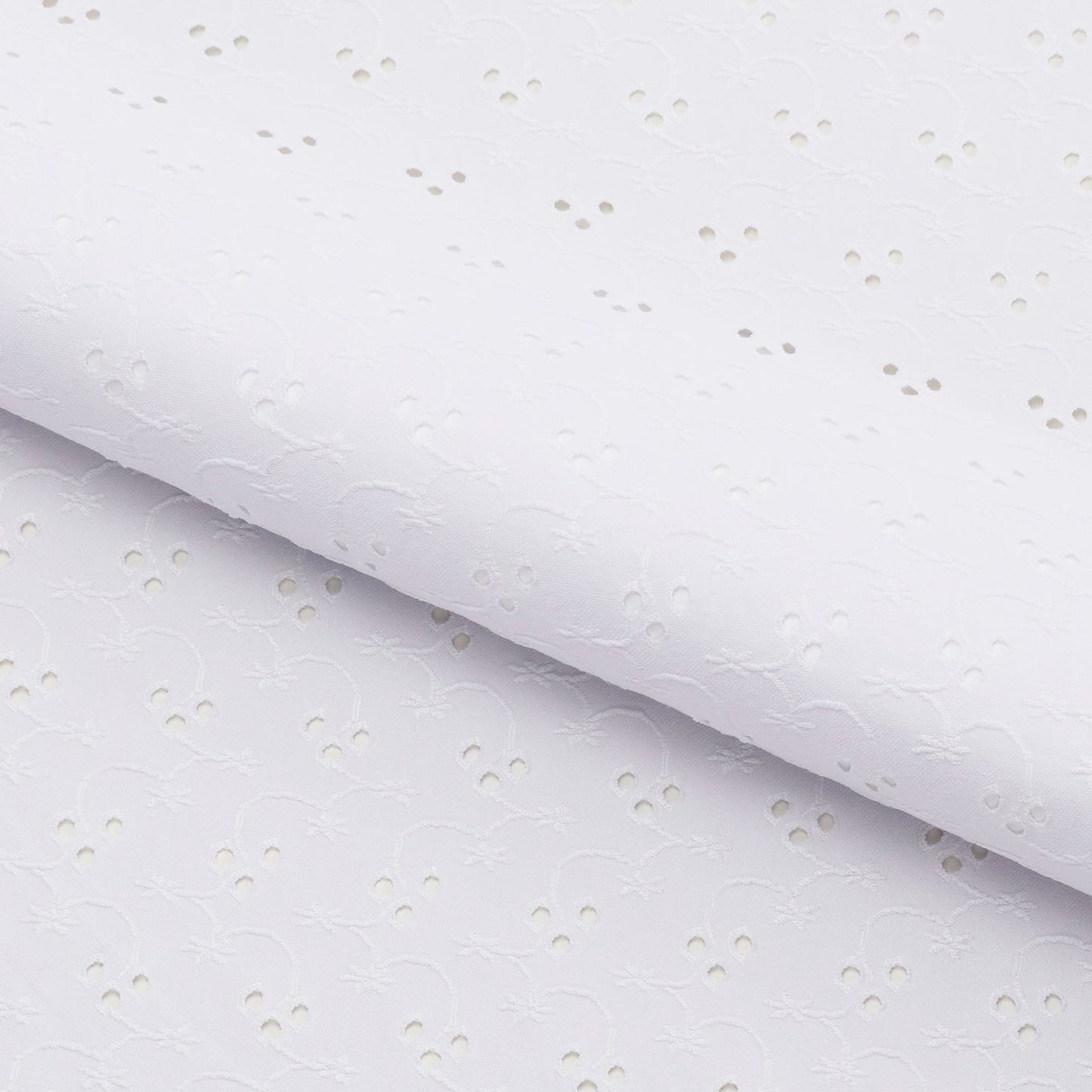 Eyelet Polyester Spandex Jacquard Fabric | Blue Moon Fabrics