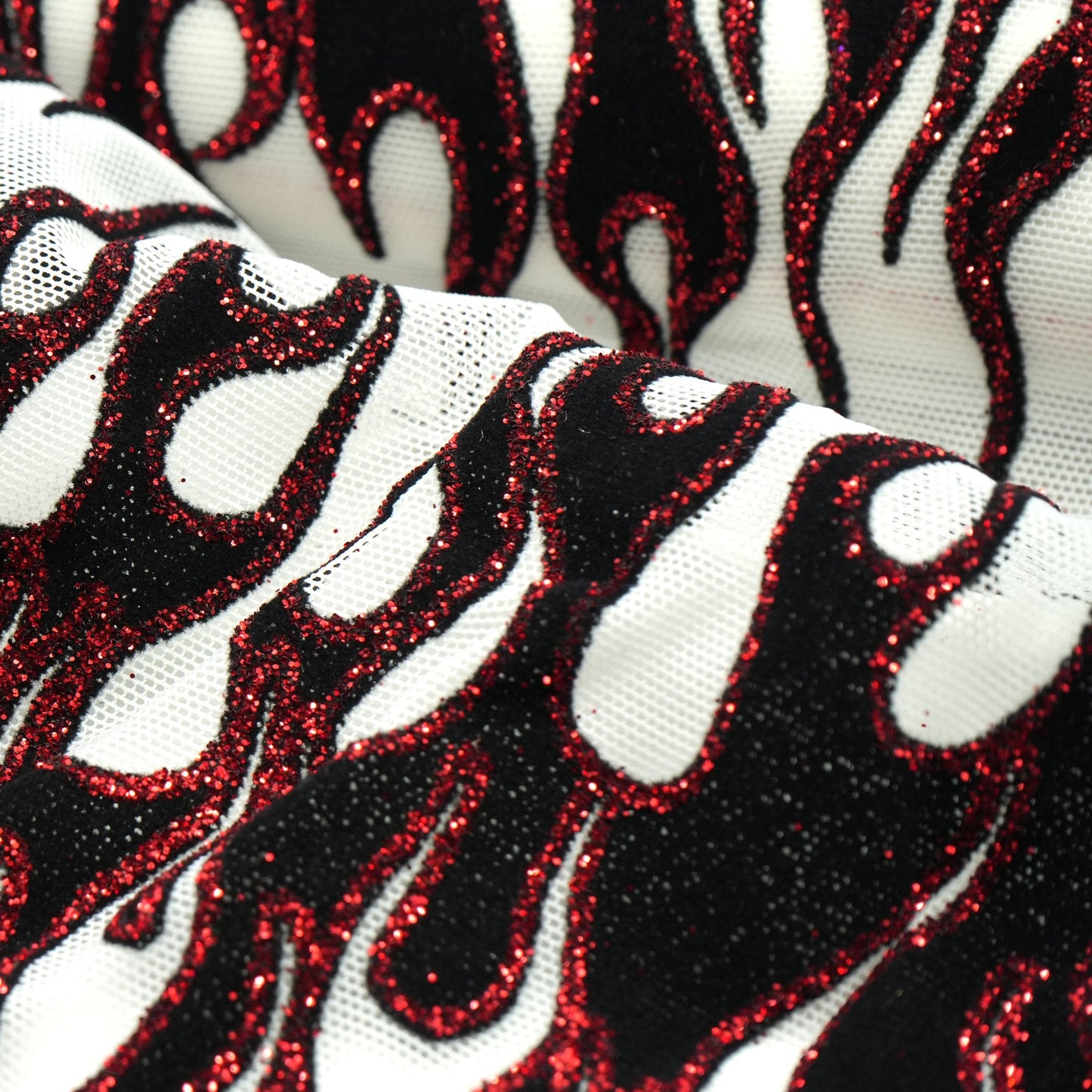 Fiery Glittered Flocked Stretch Mesh Fabric | Blue Moon Fabrics